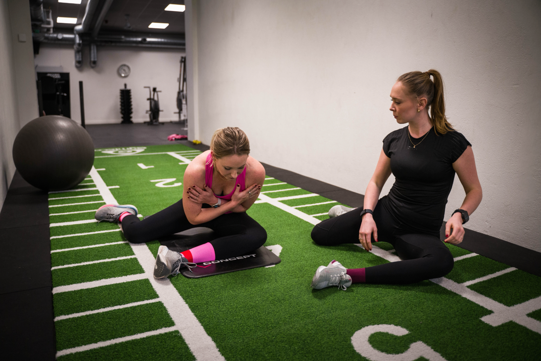 Patient performing rehabilitation exercises with physiotherapist after PRP treatment