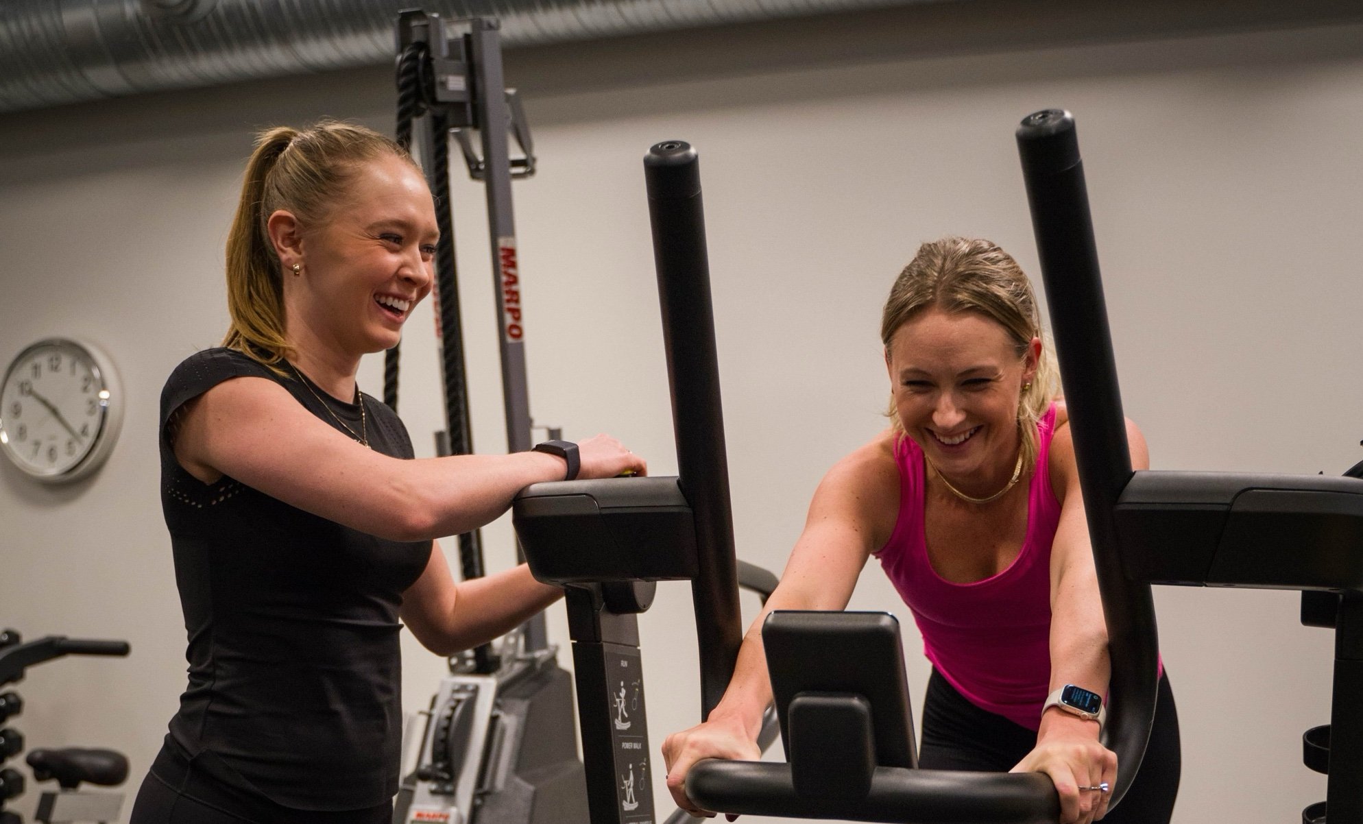 Two women training together — energy and wellbeing with HRT