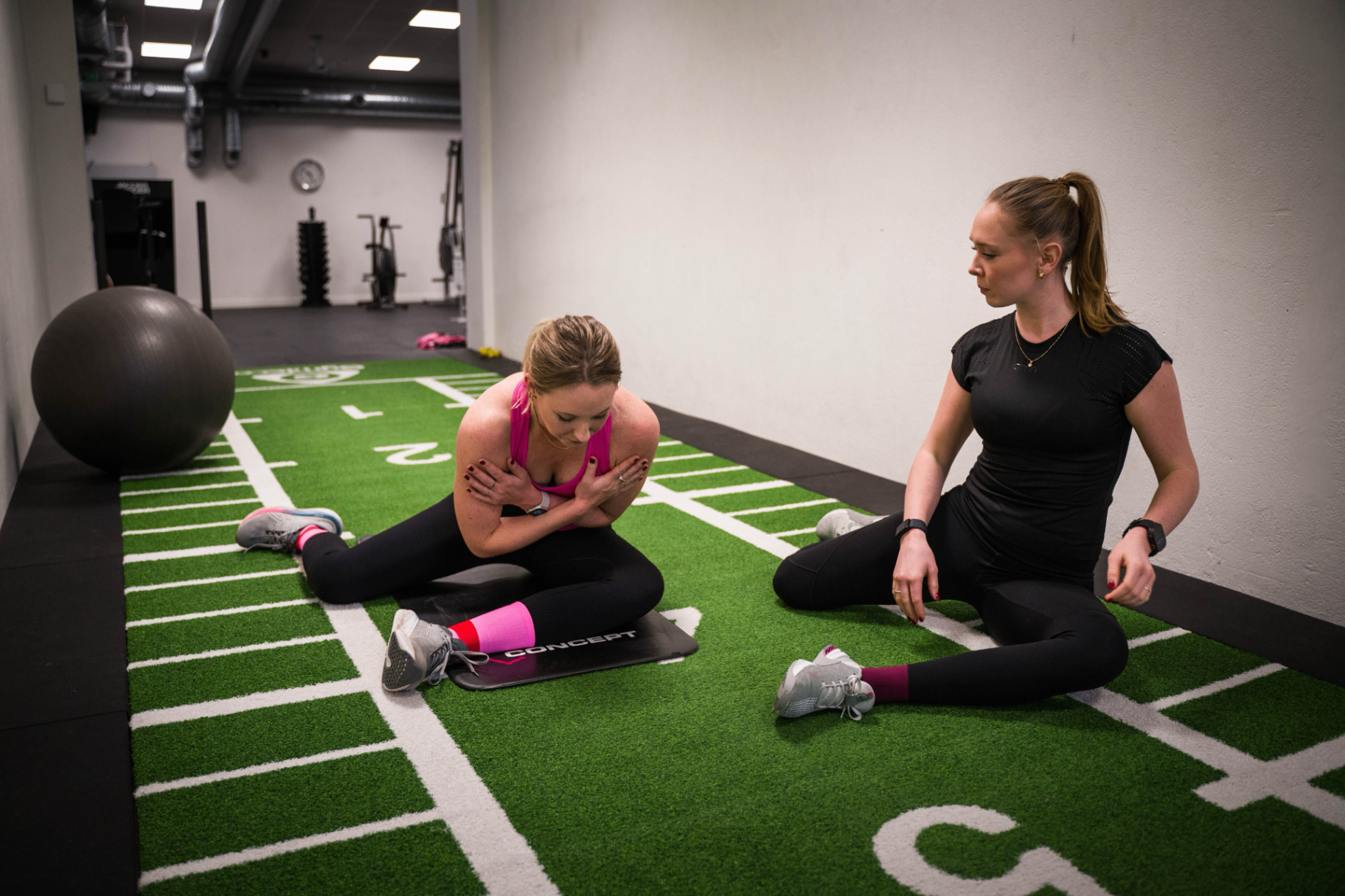 Patient and trainer during rehabilitation exercise